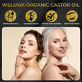 Load image into Gallery viewer, Weluxia organic castor oil applied to eyelashes for natural lash growth