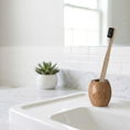 Load image into Gallery viewer, onyx-bamboo-toothbrush-lifestyle