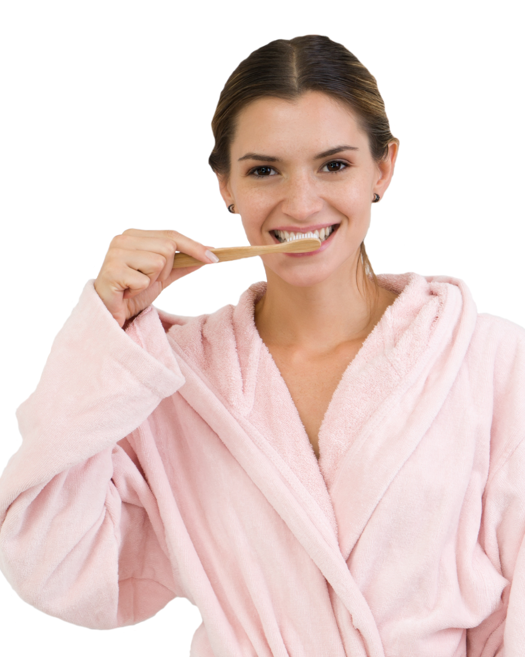 Woman brushing teeth with hydroxyapatite toothpaste for enamel remineralization