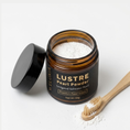 Load image into Gallery viewer, Saltwater pearl powder on a toothbrush for enamel support

