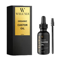 Load image into Gallery viewer, Weluxia Organic Castor Oil in amber glass bottle – cold pressed and 100% pure

